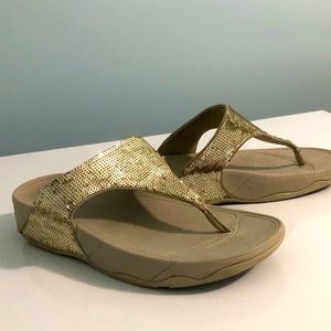 Gold sequinned fit flops